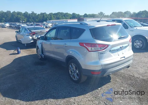 2015 Ford Escape Titanium z USA, uszkodzony, nr VIN 1FMCU0J98FUA15969